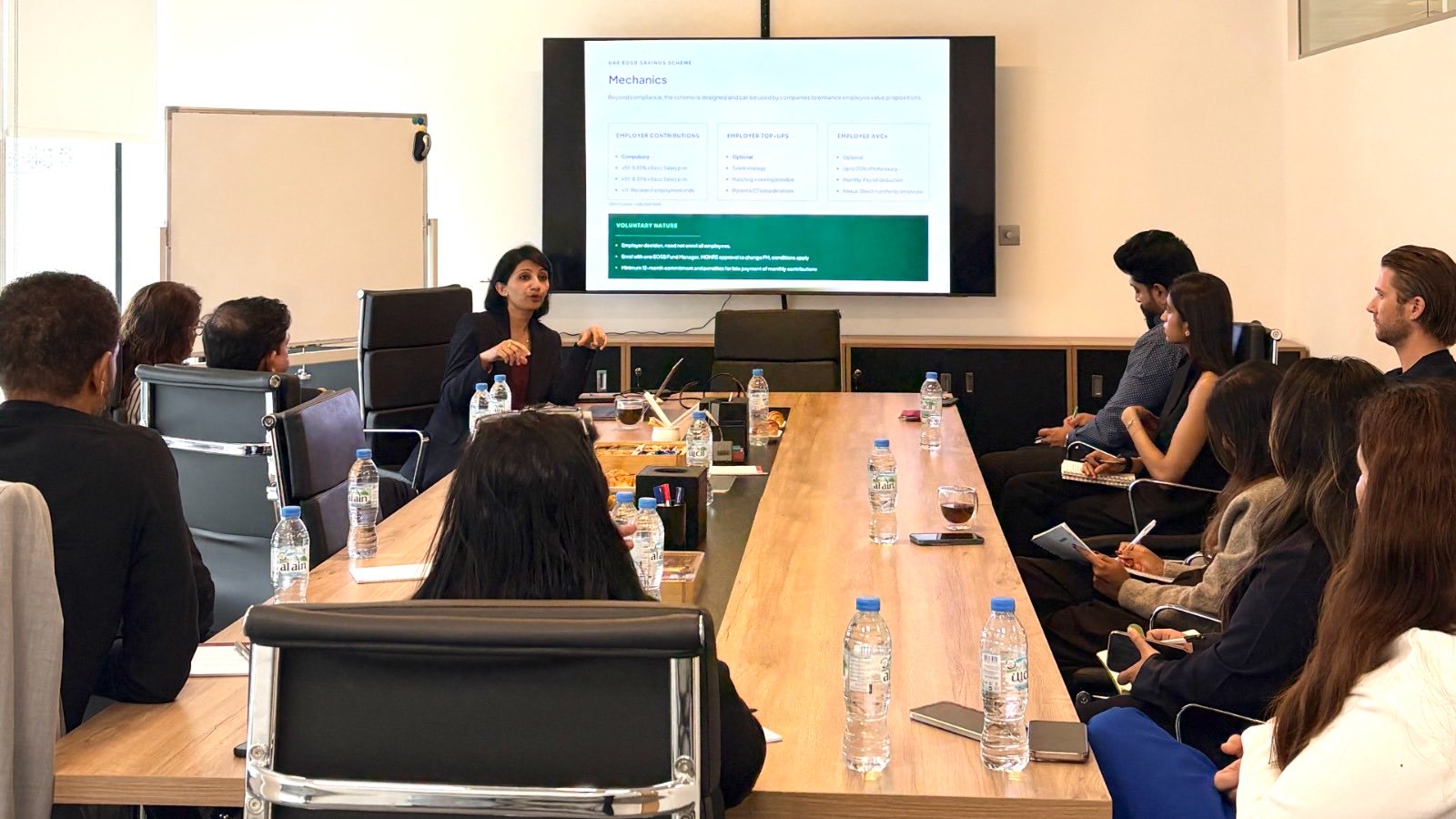 Presenter walking employers through the UAE EOSB Savings Scheme mechanics at the employer briefing in Dubai
